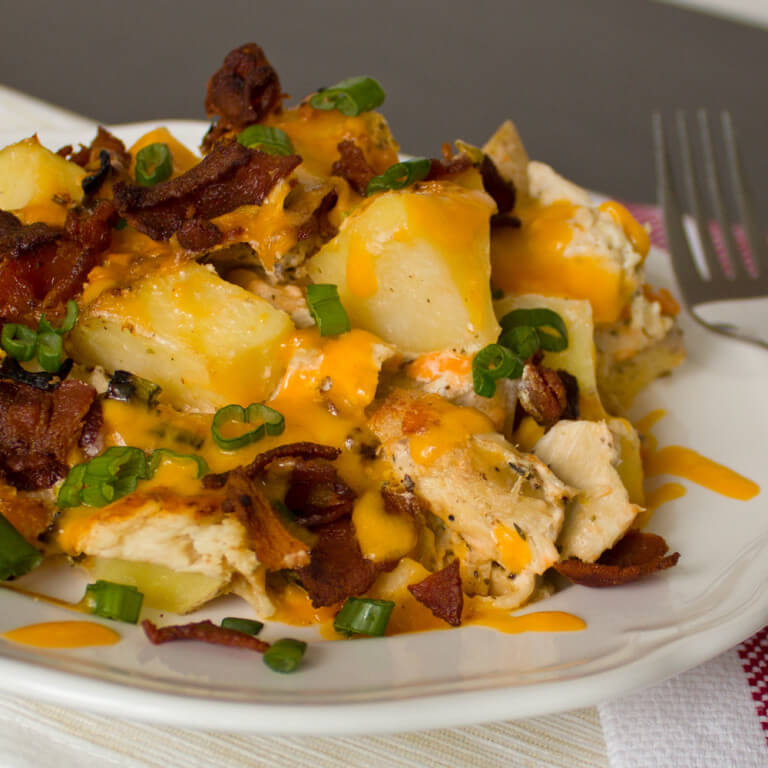 Cheesy Potato Bacon Casserole from dishesanddustbunnies.com