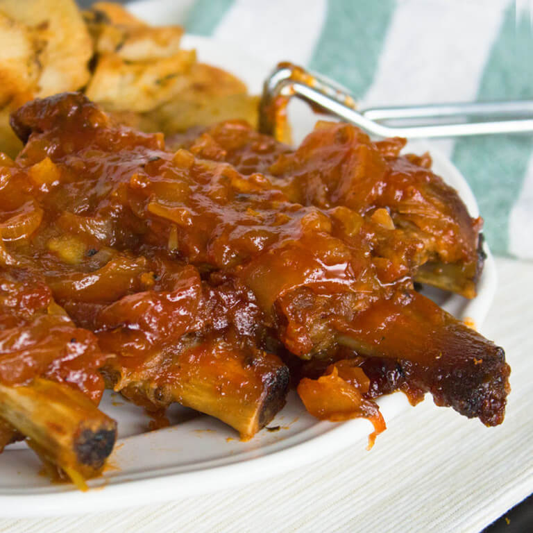 Sweet and Sticky Pineapple Ribs from dishesanddustbunnies.com